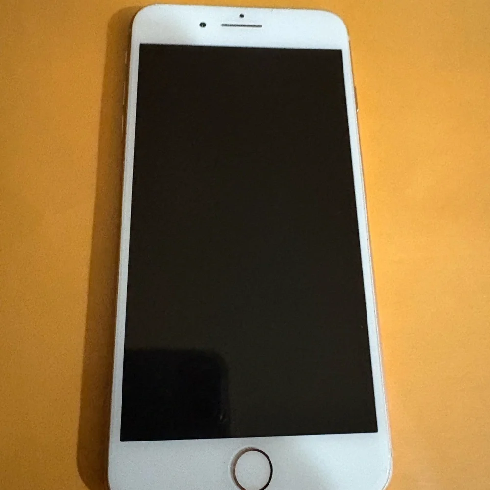 Apple iPhone rose gold and white